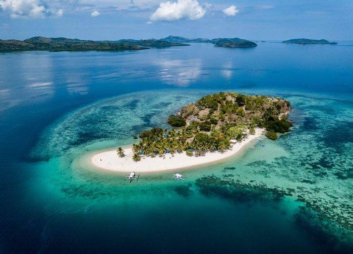 dive-sites_an-aerial-view-of-pass-island-with-a-white-sandbar